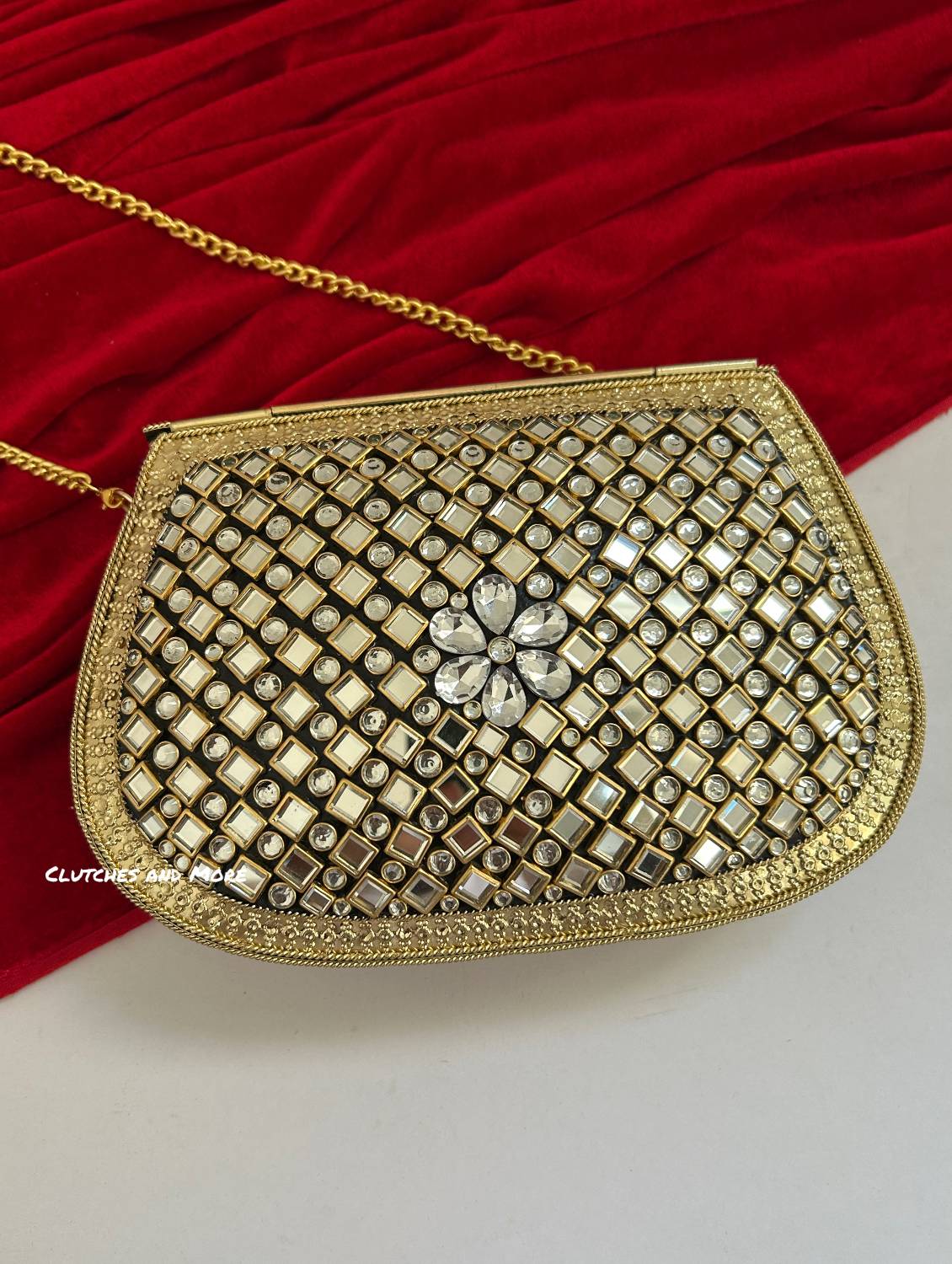 Kasika Kundan Brass Clutch Gold white