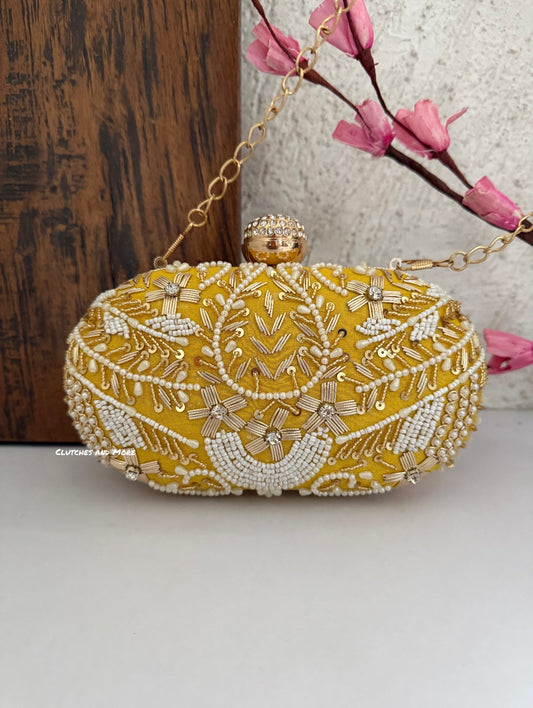 Aarohi Yellow Capsule clutch