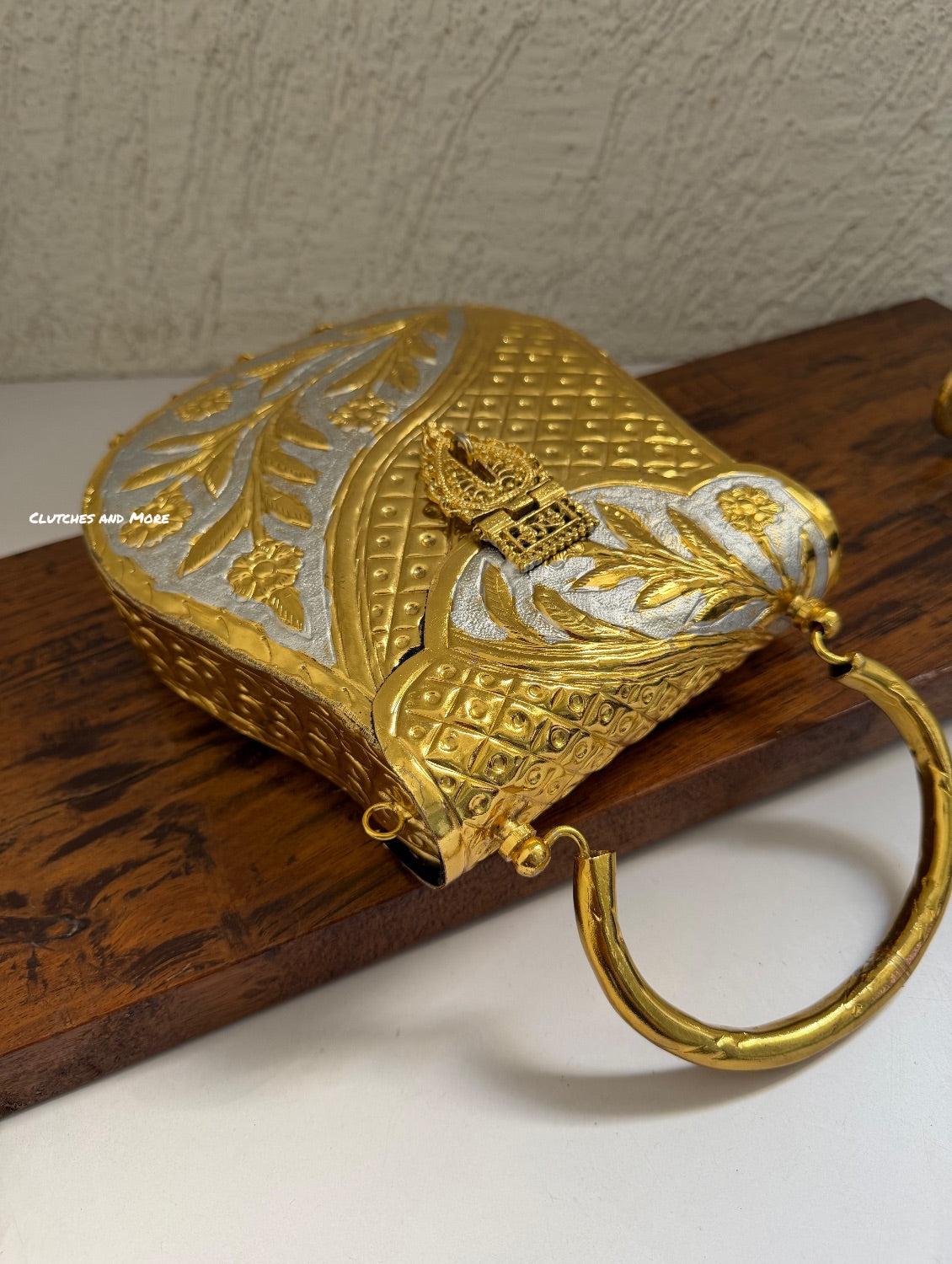 Sliver brass clutch with Gold Base