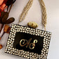 Kundan Black Resin Name clutch with Pearl Handle