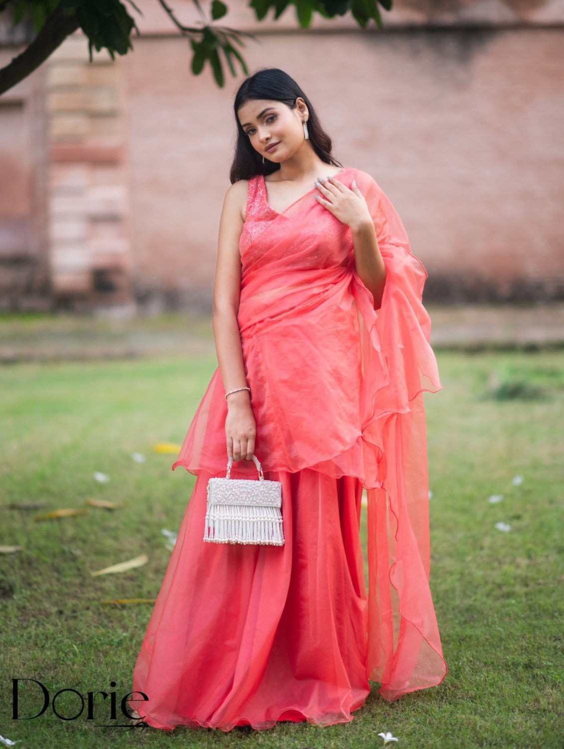 Peach Organza Pre Draped Saree Lehenga by Dorie