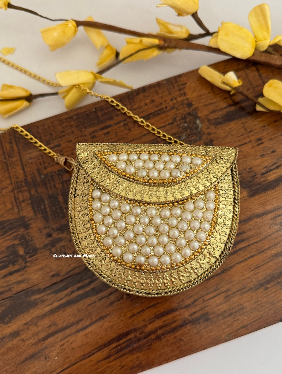 Kasika Kundan Pearl Brass Mini Clutch