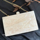 White resin clutch