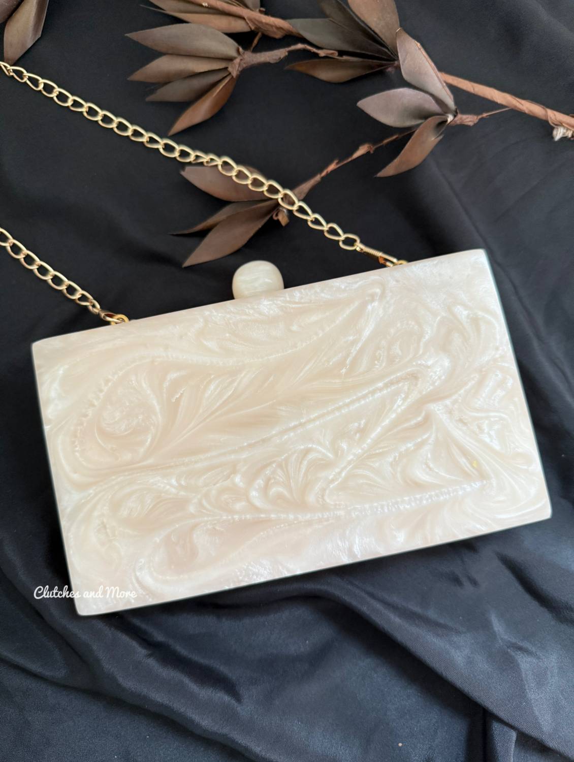 White resin clutch