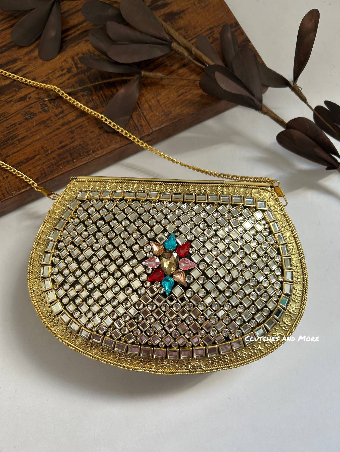 Kasika Kundan Brass Clutch Multicolored