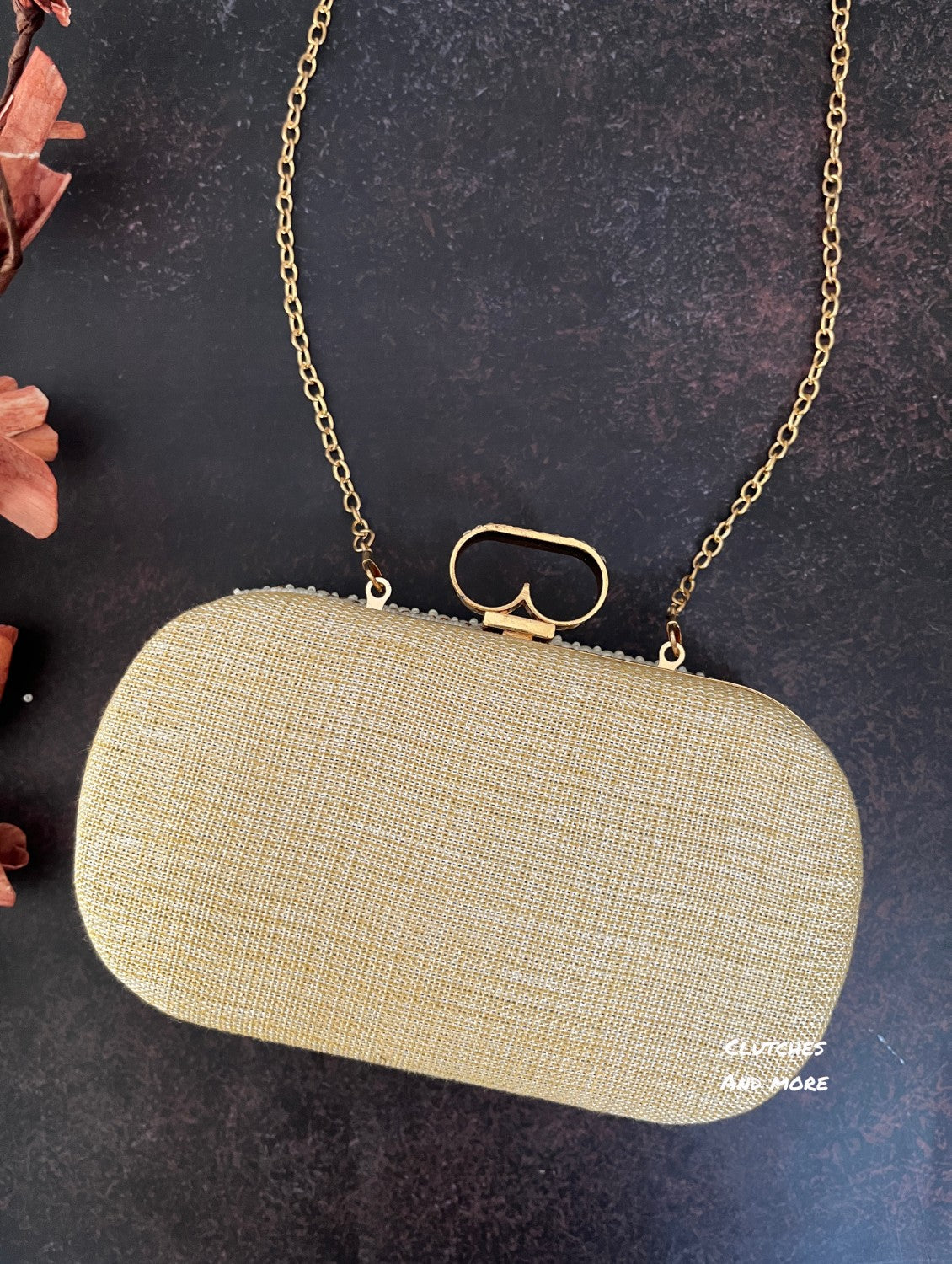 The Shell Affair capsule clutch White