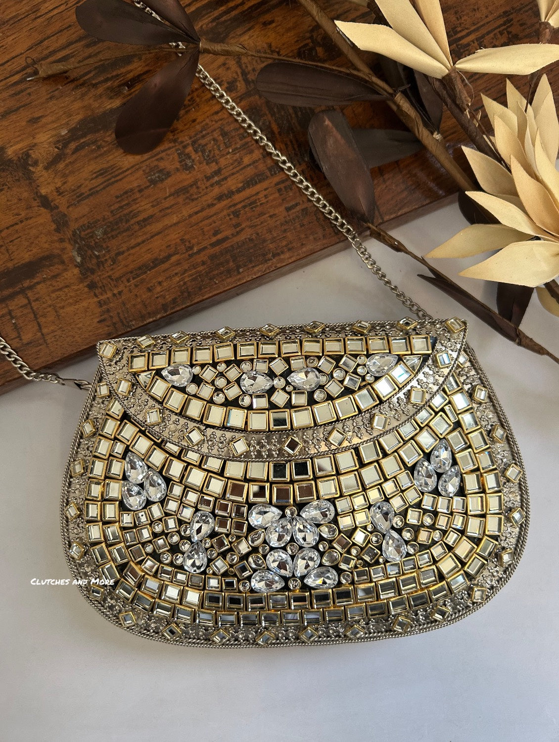 Kasika Kundan Brass Clutch Silver White