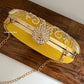 Aarohi Yellow Capsule clutch