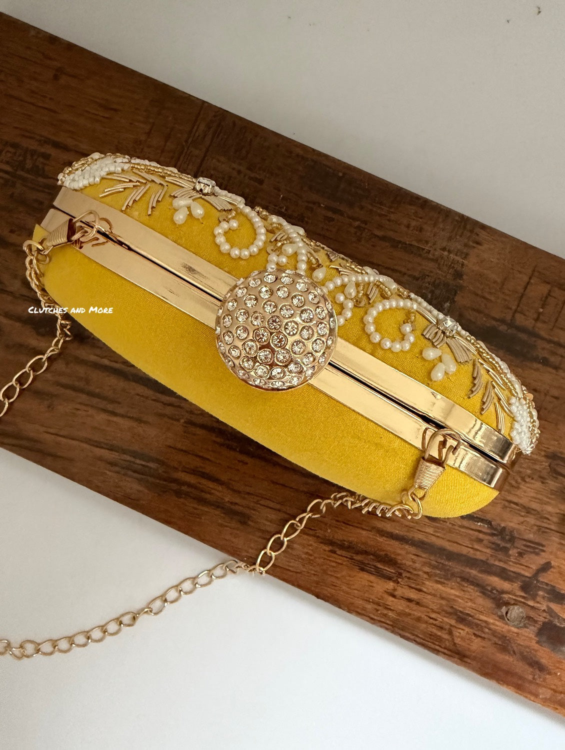 Aarohi Yellow Capsule clutch