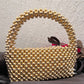 Trend Setter Gold Pearl Bag