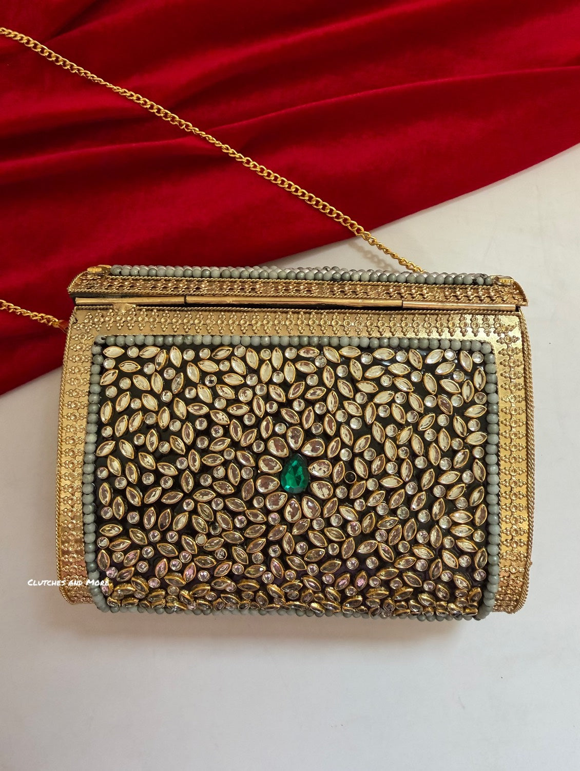 Kasika Kundan Brass Clutch Multicolored