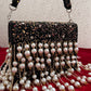 Jodha Pearl Tassle Clutch Black