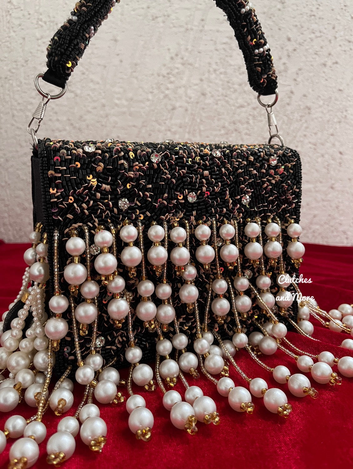 Jodha Pearl Tassle Clutch Black