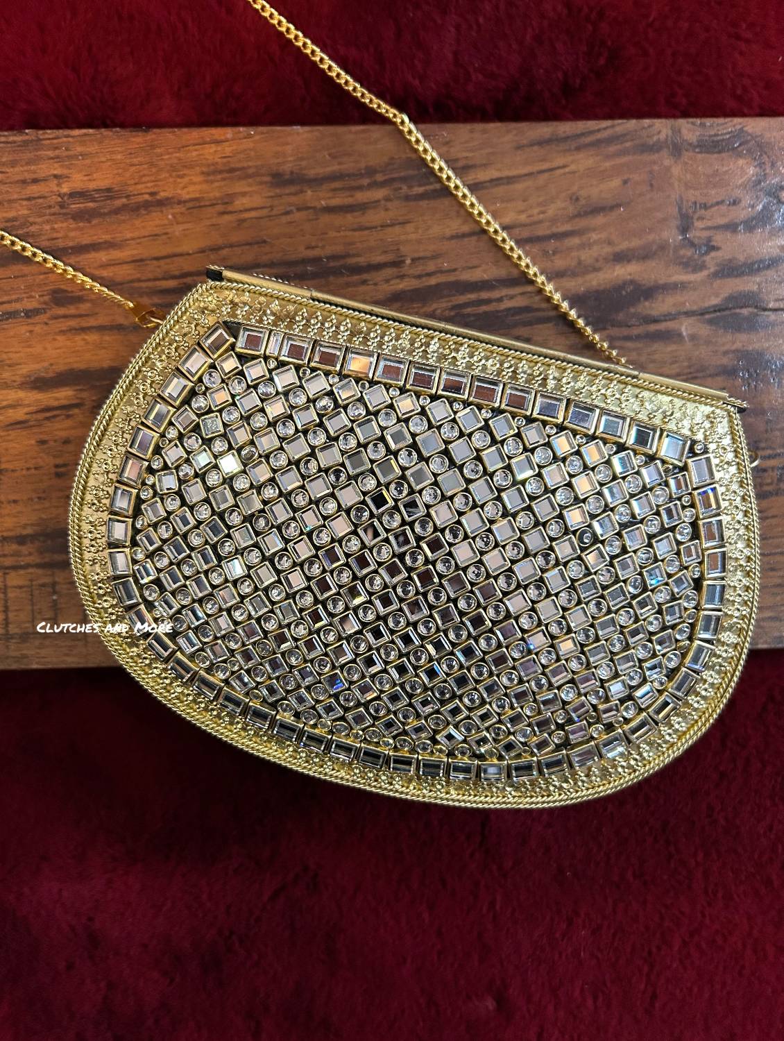 Kasika Kundan Brass Clutch with Pink Blue