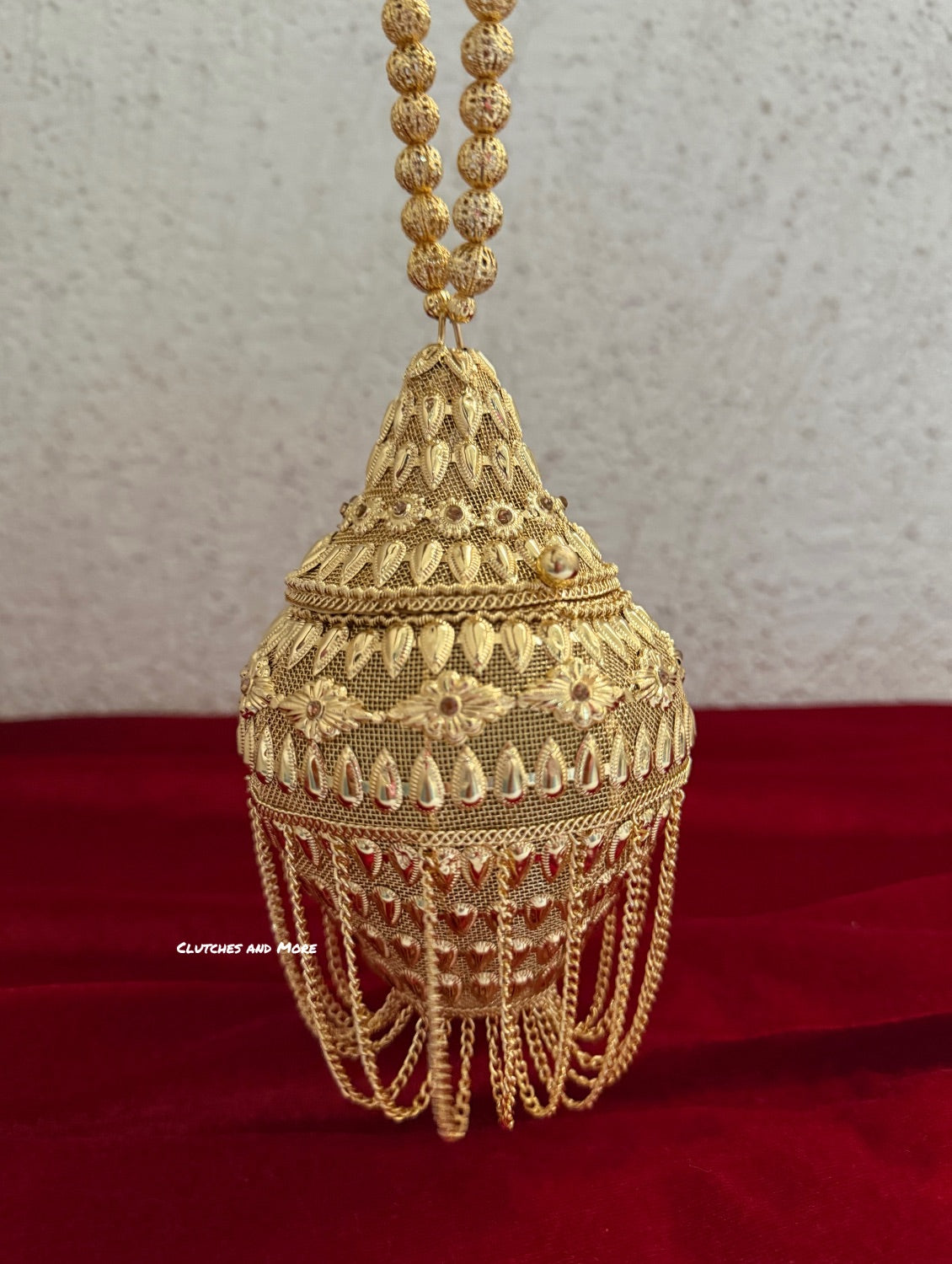Mini Metal Potli Bag With Tassle ( Gold )