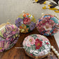 Poppy Floral Round Multicolored Clutch ( Lavender Base )