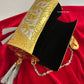Vamika Cylindrical Gold Silver Brass Clutch with Tassles