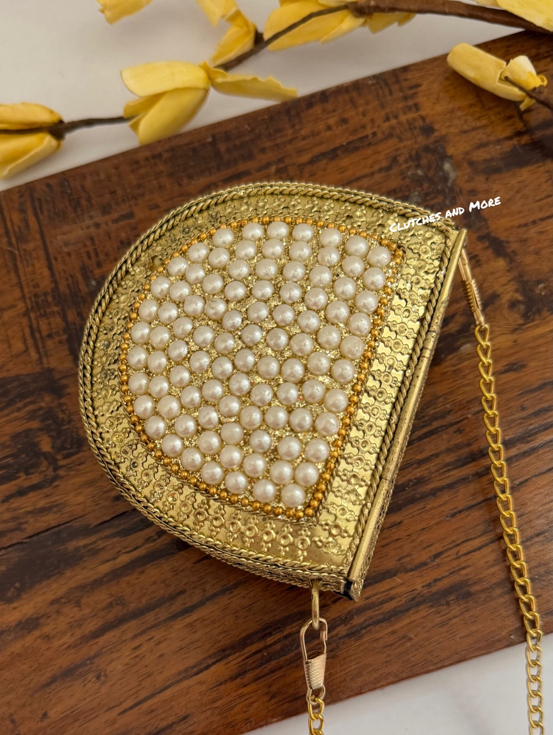 Kasika Kundan Pearl Brass Mini Clutch