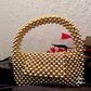 Trend Setter Gold Pearl Bag