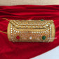 Kasika Kundan Brass Clutch Cylindrical ( with multicolored stones )