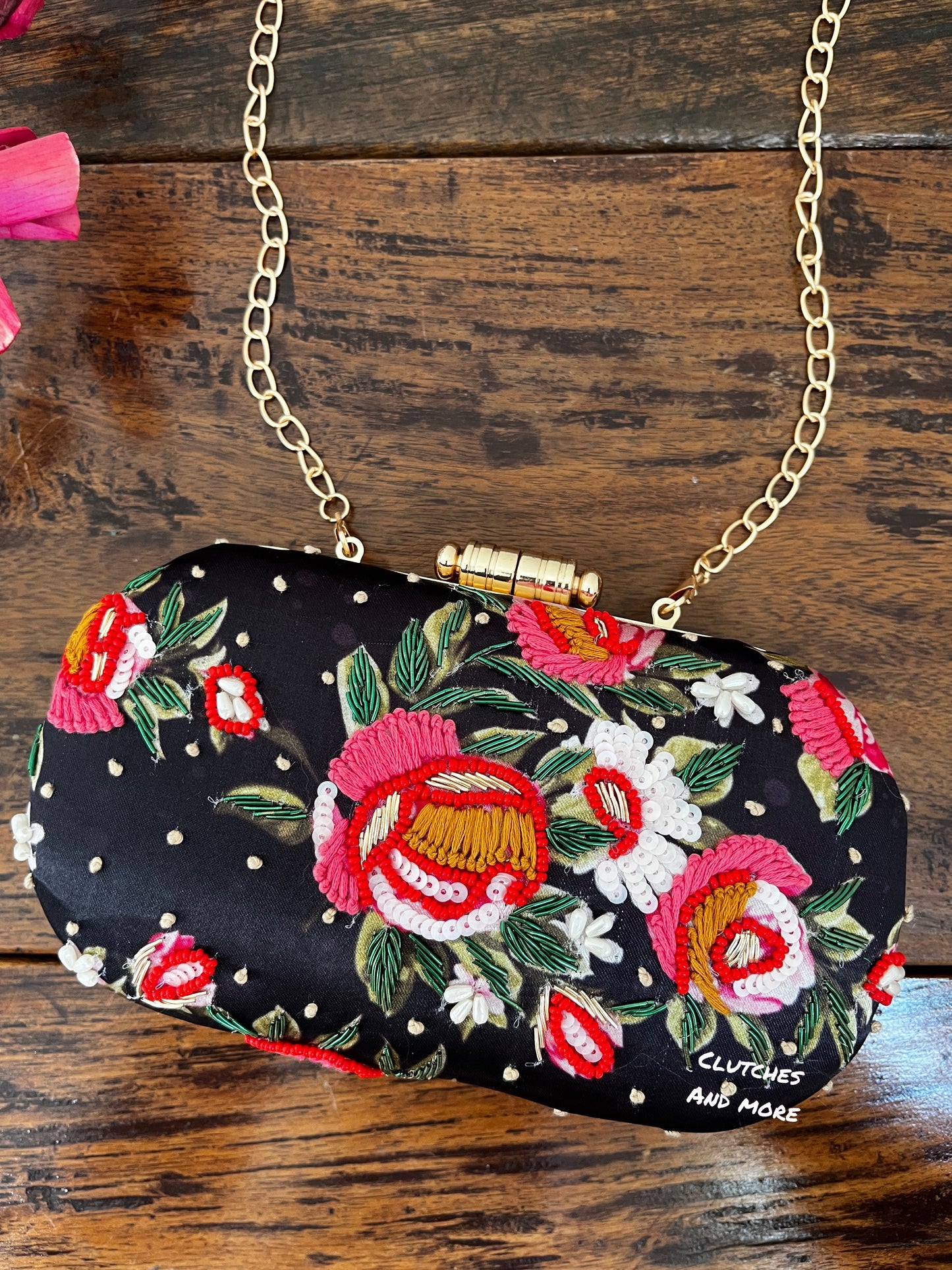 Black Floral capsule clutch