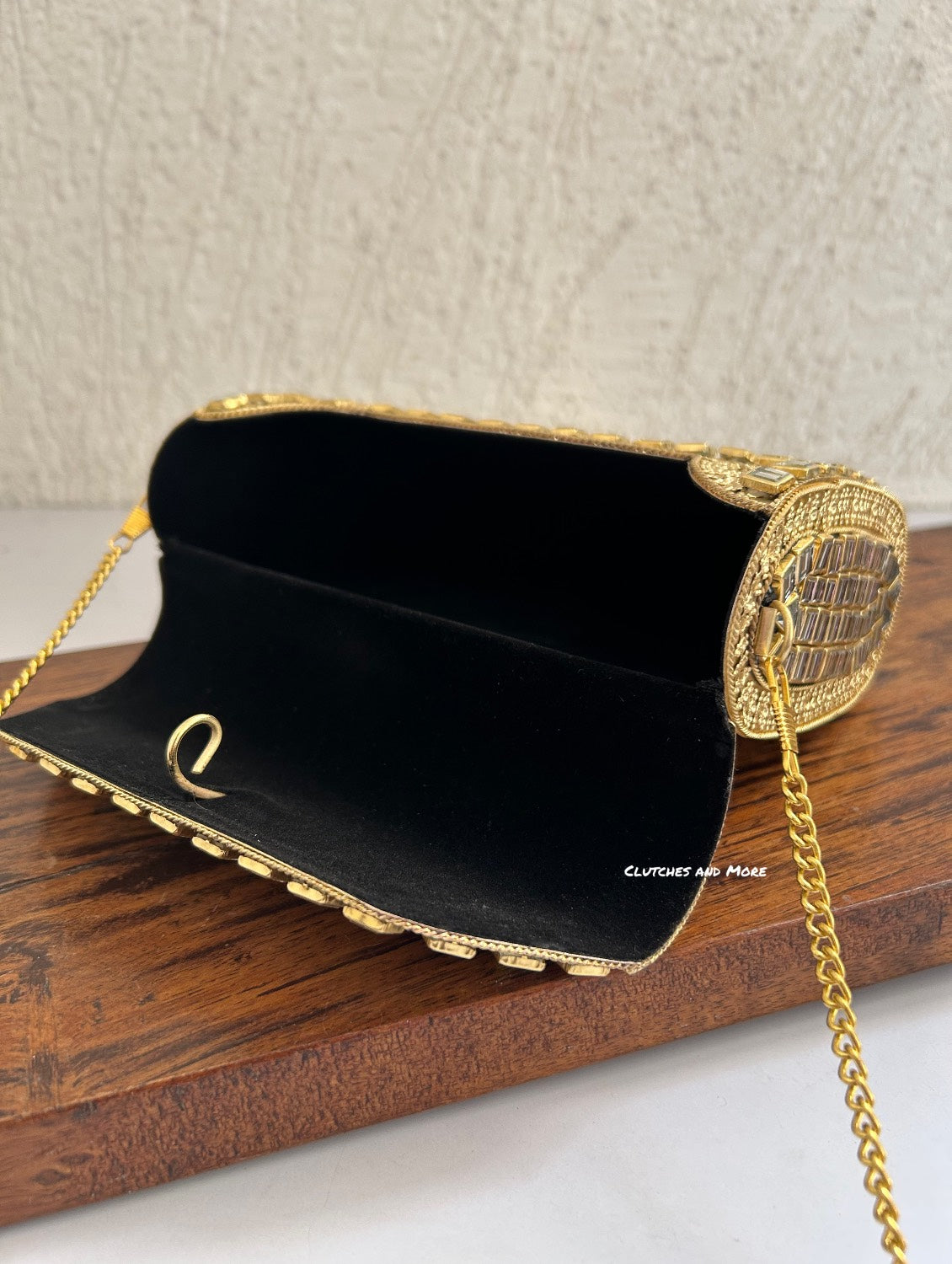 Kasika Kundan Brass Clutch Multicolored