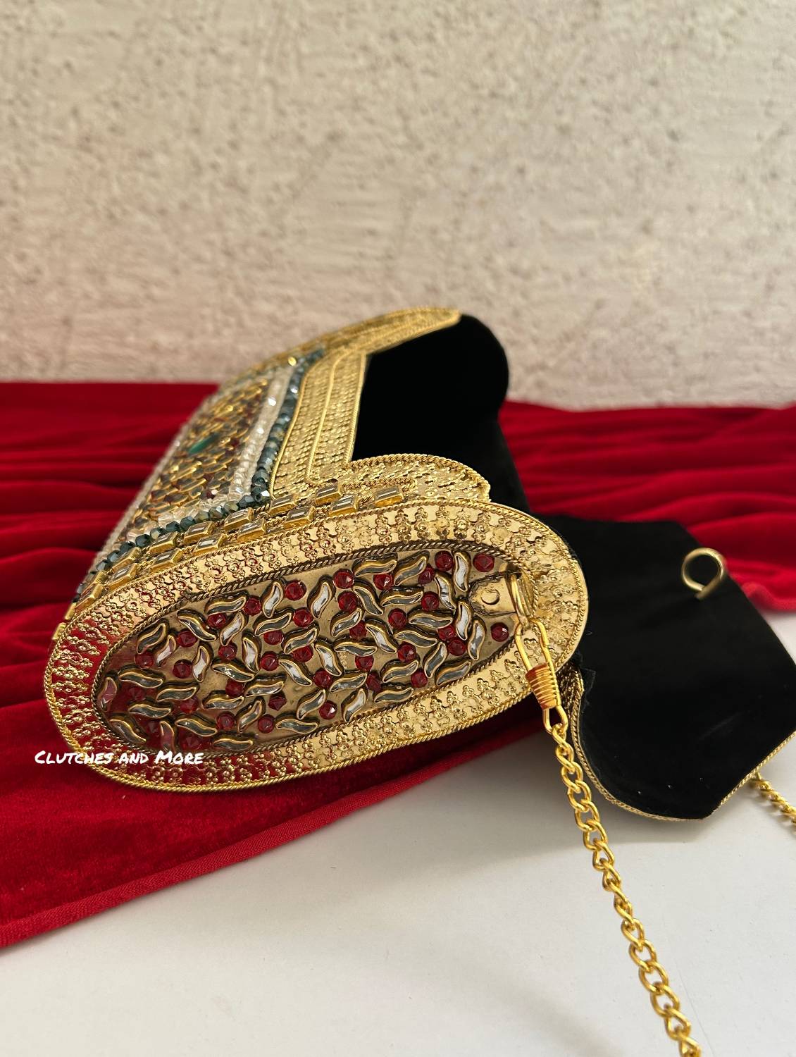 Kasika Kundan Brass Clutch Multicolored
