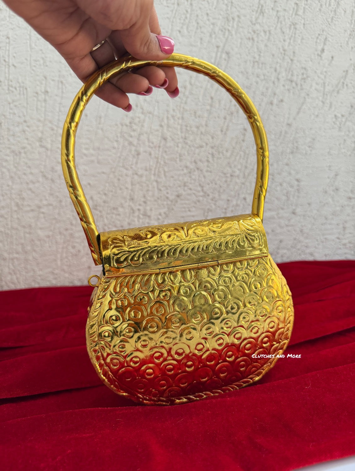 Ridhima Brass Clutch Gold
