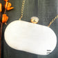 White and Gold Capsule Clutch