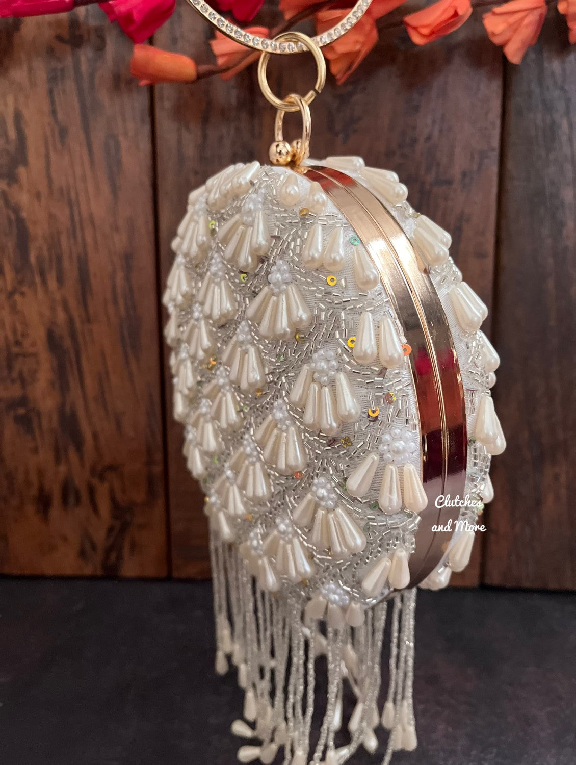 Praneeta Pearl Droplets Round Clutch