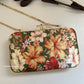 Poppy Green Multicoloured Floral Clutch
