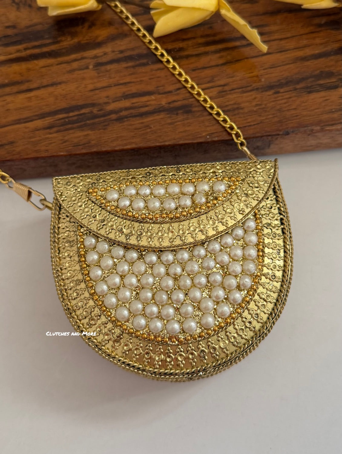 Kasika Kundan Pearl Brass Mini Clutch