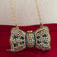 Kiana Kundan Bow Clutch Green Gold