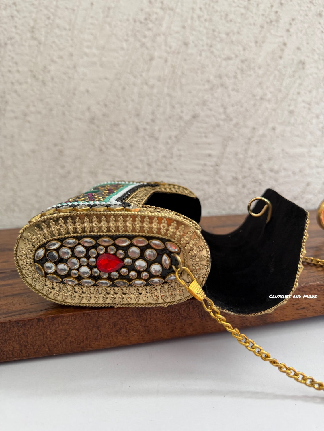 Kasika Kundan Brass Clutch Mini Pink Green