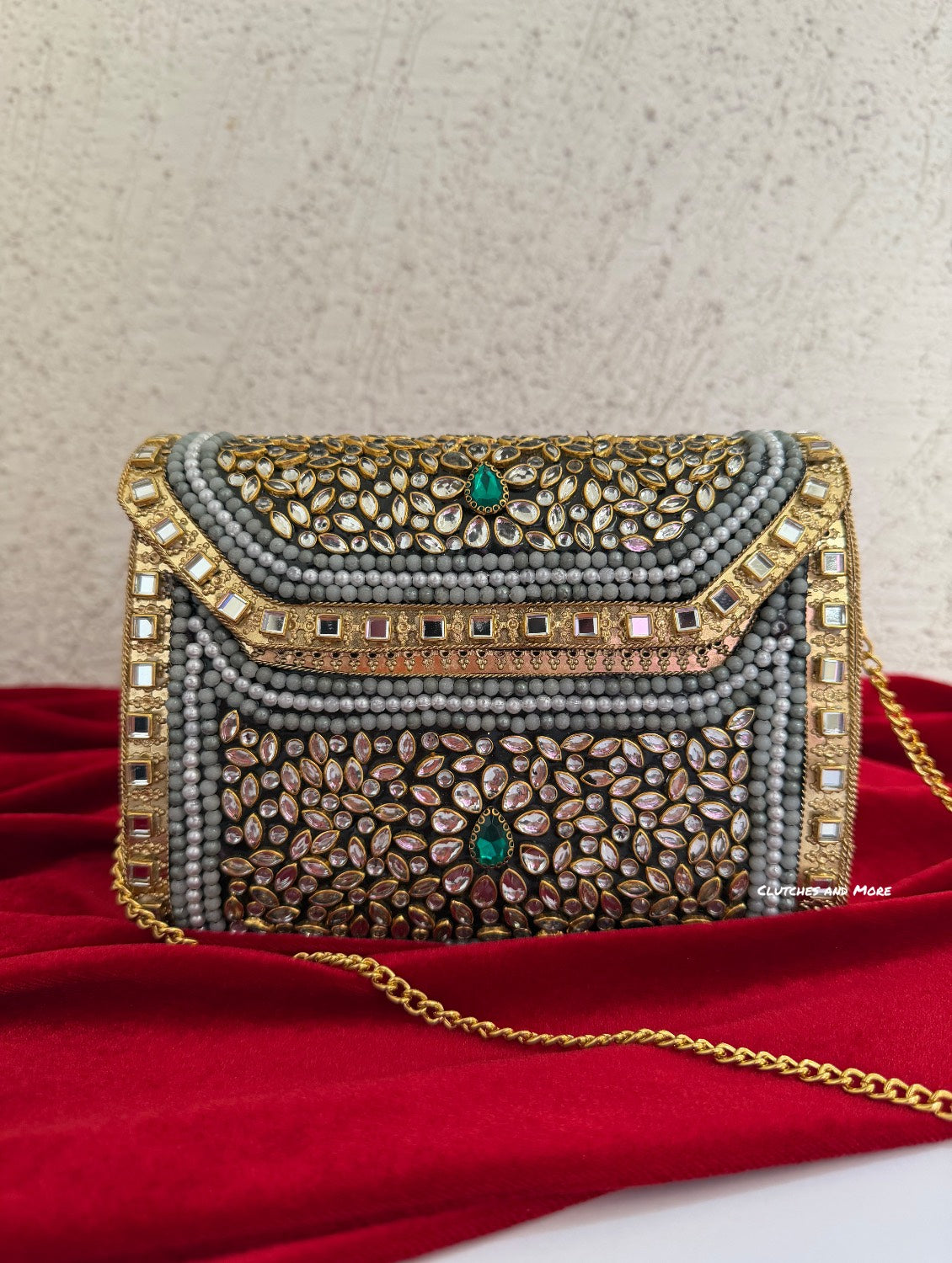 Kasika Kundan Brass Clutch Multicolored