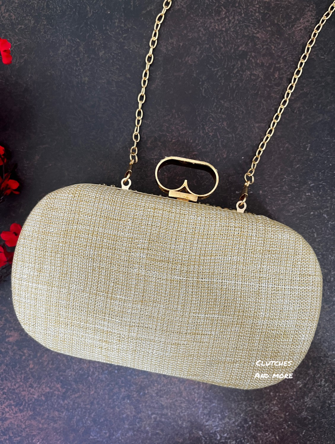 The Shell Affair capsule clutch Gold