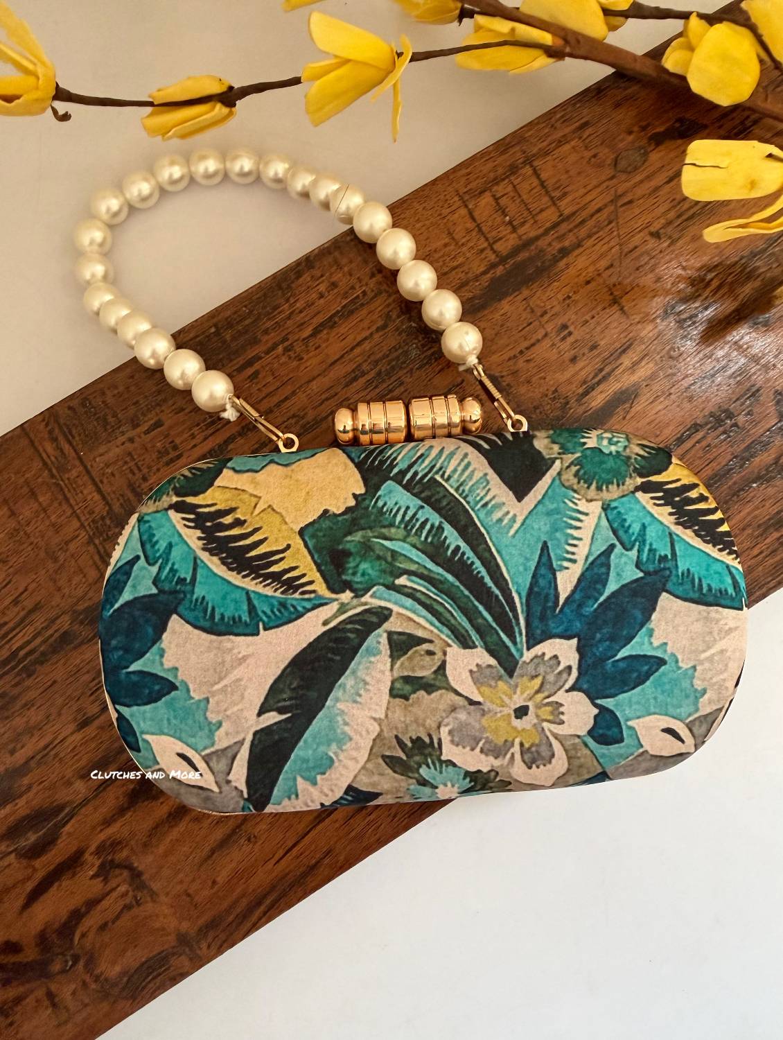 Paradise Blue Multicolored Floral Clutch