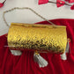 Vamika Cylindrical Gold Silver Brass Clutch with Tassles