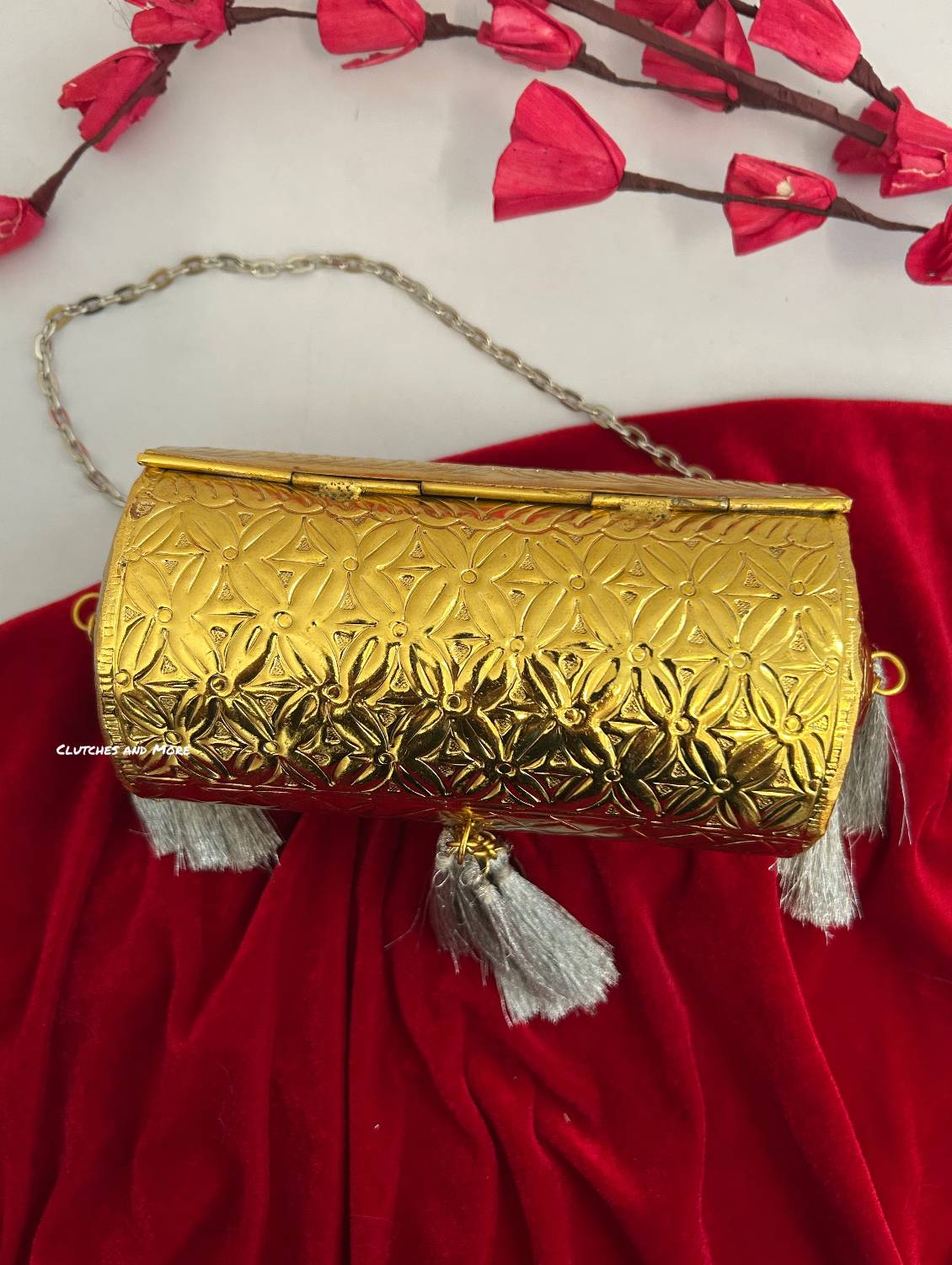 Vamika Cylindrical Gold Silver Brass Clutch with Tassles