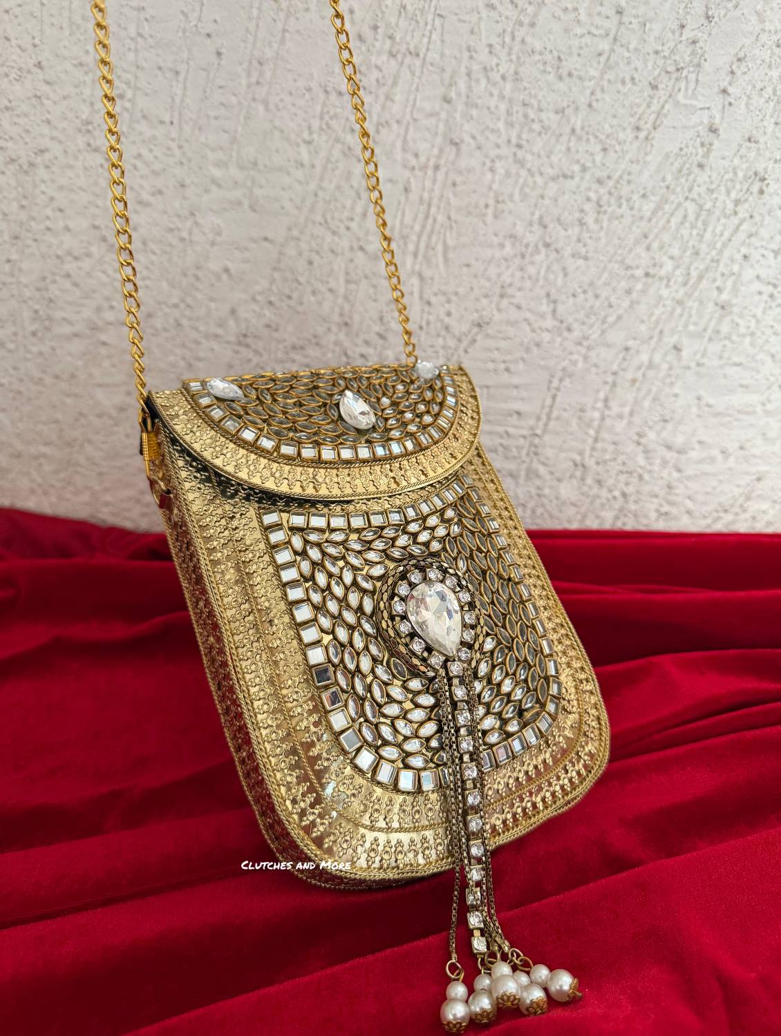 Kasika Kundan Brass Mobile Clutch