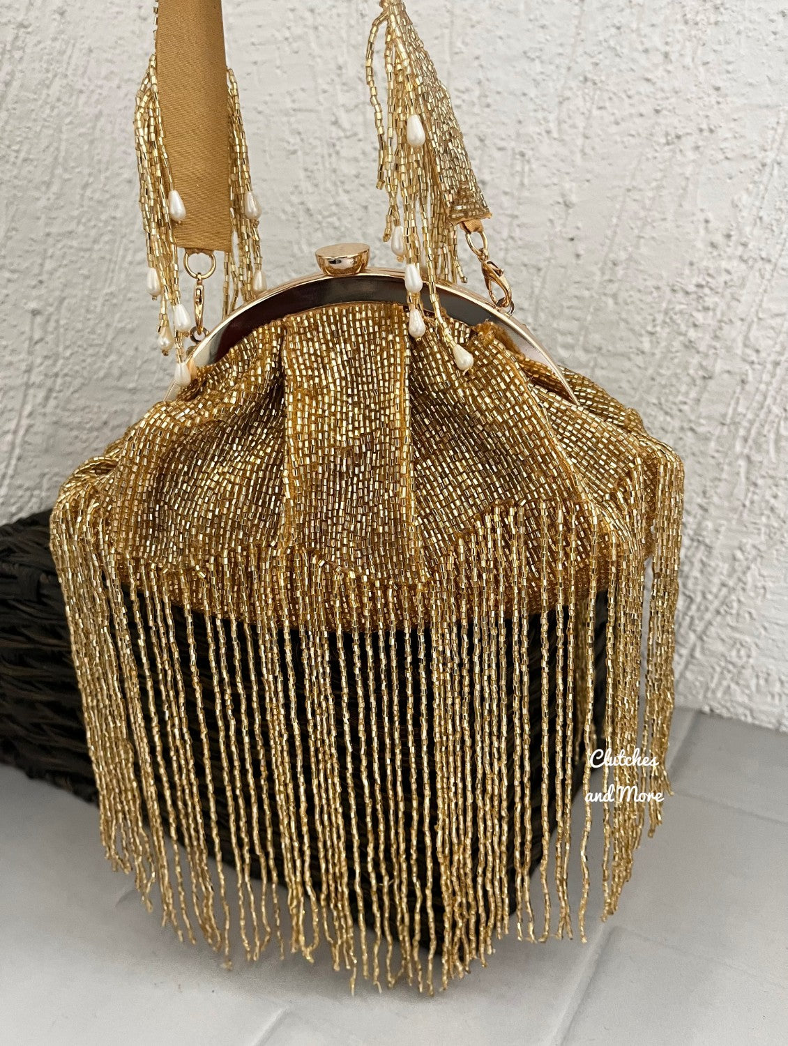 Golden Batua Bag with long Tassles