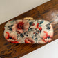 Poppy Floral Capsule Clutch Peach Green Multicoloured
