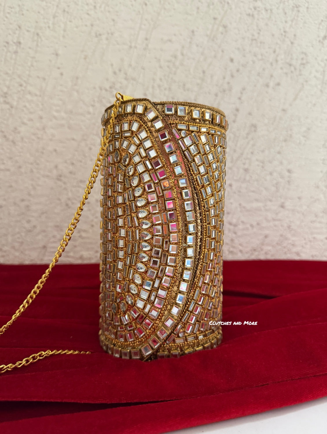 Kasika Kundan Brass Clutch Cylindrical Gold