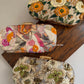 Poppy Floral Capsule Clutch Multicoloured