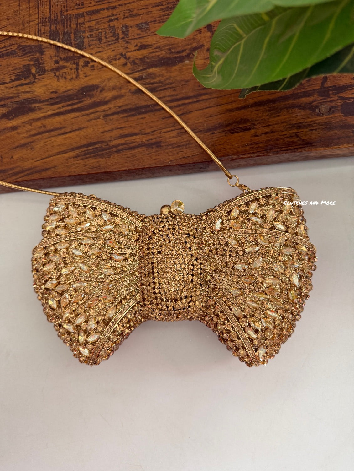 Regal Crystal Bow Clutch
