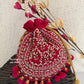 Rani Pink Ball Tassles Potli