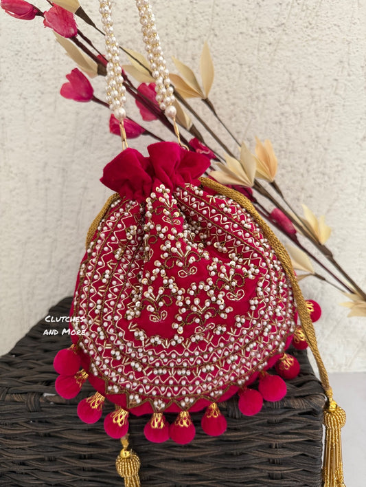 Rani Pink Ball Tassles Potli