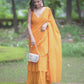 Yellow Georgette Pre Draped Saree by Dorie