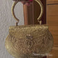 Gold brass clutch with handle