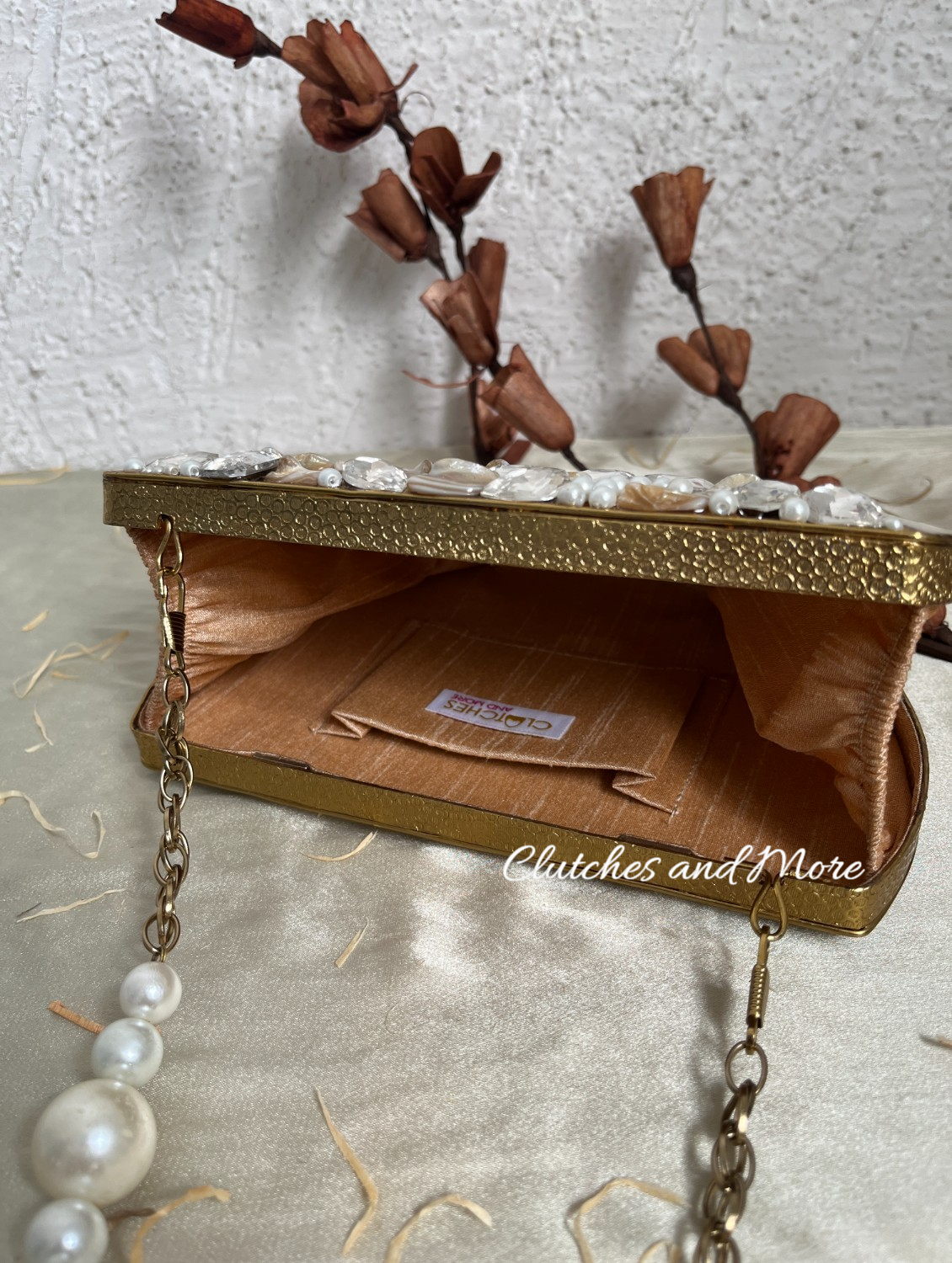 Half moon mother of pearl clutch